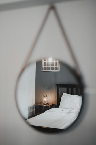 Una cama o camas en una habitación de No8 Boutique Hotel - self check in
