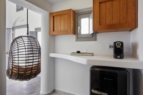 Η κουζίνα ή μικρή κουζίνα στο Allure Breeze Suites