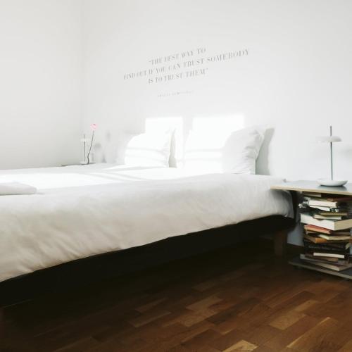 Кровать или кровати в номере Bookinn B&B Welcome to Vilnius' Old Town