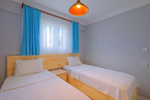 Katil atau katil-katil dalam bilik di Gold Lion Apart Hotel