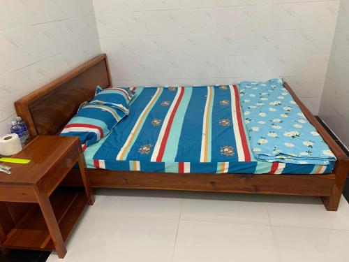 Nhà nghỉ Bình An tesisinde bir odada yatak veya yataklar