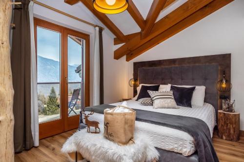 Postel nebo postele na pokoji v ubytování Hotel Folgarida