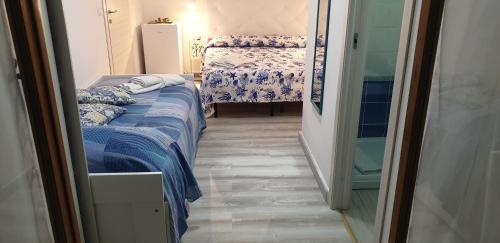Ένα ή περισσότερα κρεβάτια σε δωμάτιο στο Eolie House