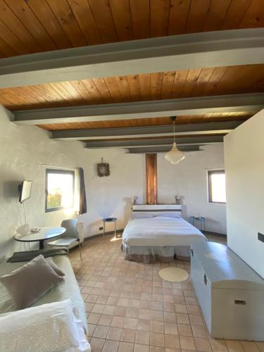 Postel nebo postele na pokoji v ubytování I Silos Guest house