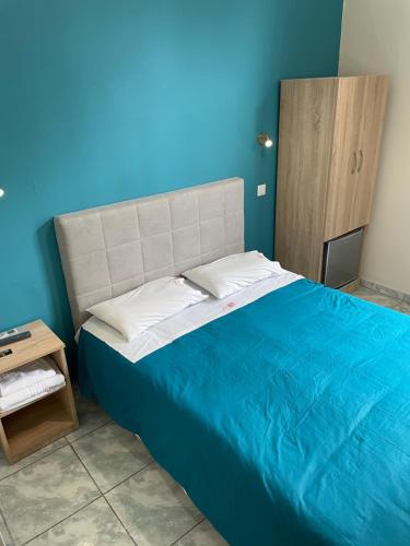 Ένα ή περισσότερα κρεβάτια σε δωμάτιο στο Hotel Kastoria 