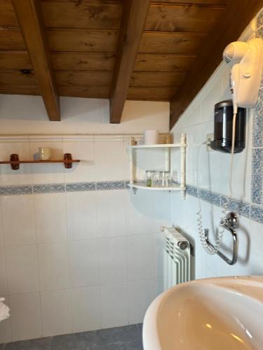 a bathroom with a sink and a shower at Casa Albertino in El Tejo