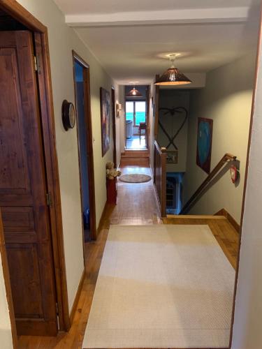 a hallway leading to a home with a hallway leading to a house at MOULIN CROZET in Montceaux