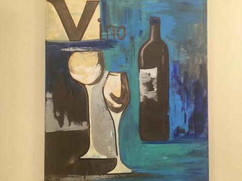 a painting of a bottle of wine and a wine glass at Vino Apartman in Eger