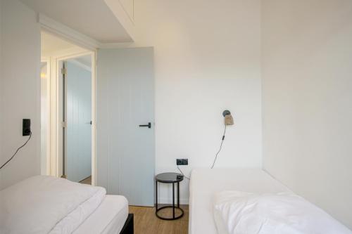Postel nebo postele na pokoji v ubytování De Duintuin - In de duinen! - Groote Keeten