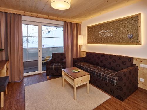Zona de estar de Hotel Venter Bergwelt