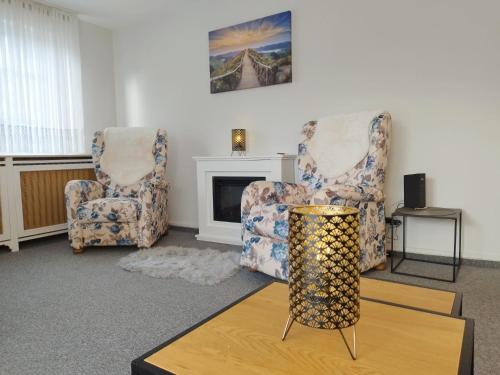 Posezení v ubytování Großzügiges und helles 2-Zimmer-Appartement im Kurgebiet