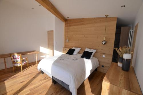Posteľ alebo postele v izbe v ubytovaní Chalet le Vertical - Chalet5*, sauna, jacuzzi, billard, balnéo, massage, pistes à 150 m