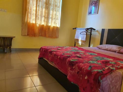 Postel nebo postele na pokoji v ubytování Teratak Nipah Homestay Teluk Nipah Pangkor