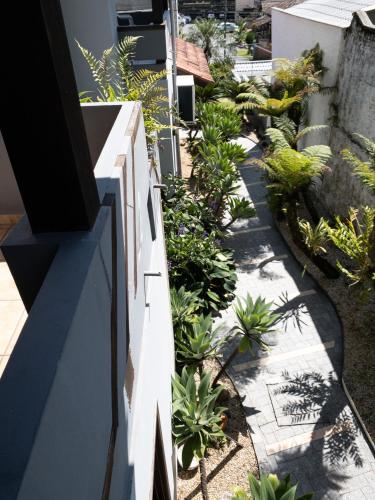 Taman di luar Pousada DRIRIOS HOUSE