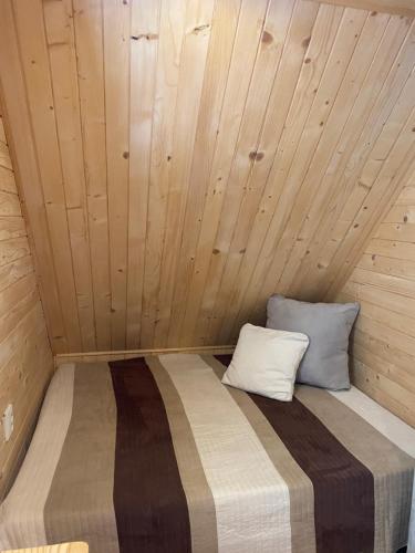 Postel nebo postele na pokoji v ubytování Perníková chalúpka