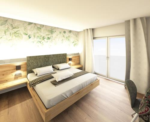 Un pat sau paturi într-o cameră la Haus Tirol