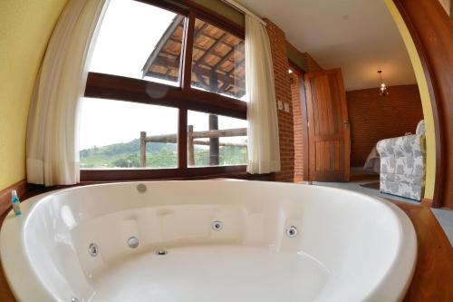 Ванна кімната в Pousada Villa dos Leais