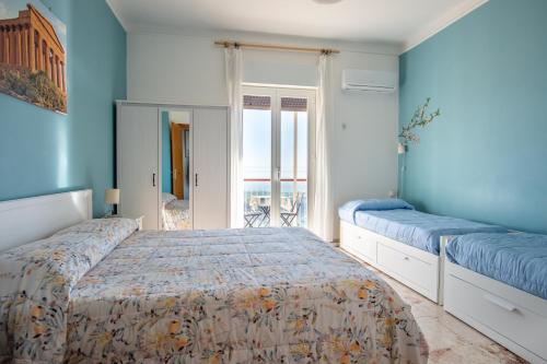 Krevet ili kreveti u jedinici u okviru objekta B&B MiraValle Agrigento