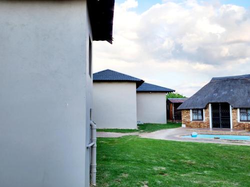 a view from the outside of a house at Savanna Buffalo Guest House in eMalahleni