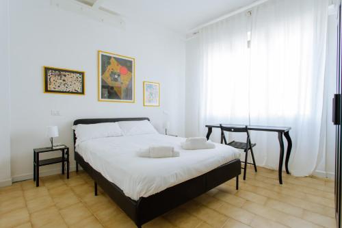 Postel nebo postele na pokoji v ubytování Yourbanflat Rooftop