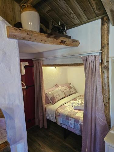 a bedroom with a bed in a room at Tiernan's Luxury Accommodation in Newtown-Dillon