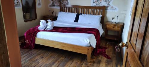 Cama o camas de una habitación en Loki Cusco