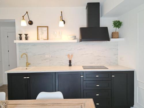 Η κουζίνα ή μικρή κουζίνα στο Apartamentos BEJAR - DUCAL