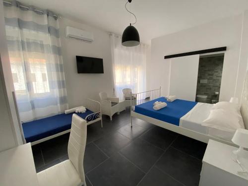Postel nebo postele na pokoji v ubytování B&B FRONTEMARE San Salvo Marina CH