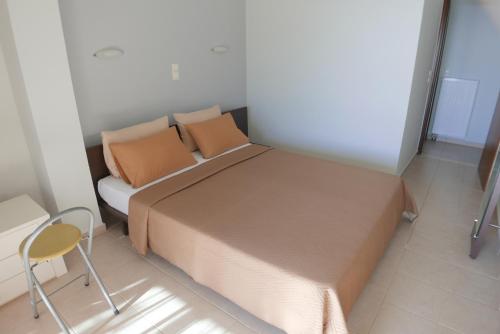 Postel nebo postele na pokoji v ubytování Renting House GALINI