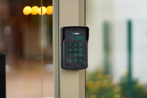 a remote control is attached to a wall at Costa Solar Lagoa in Florianópolis