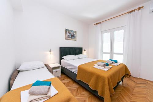 Posteľ alebo postele v izbe v ubytovaní Apartment Pisak 5975c
