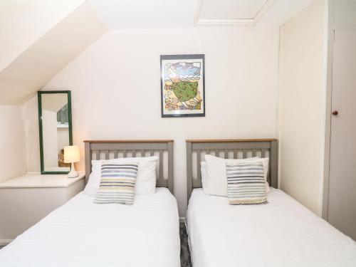 Postel nebo postele na pokoji v ubytování Quarry Cottage