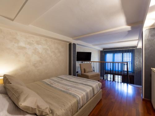 Ένα ή περισσότερα κρεβάτια σε δωμάτιο στο La casa di Olivia by Home a porter