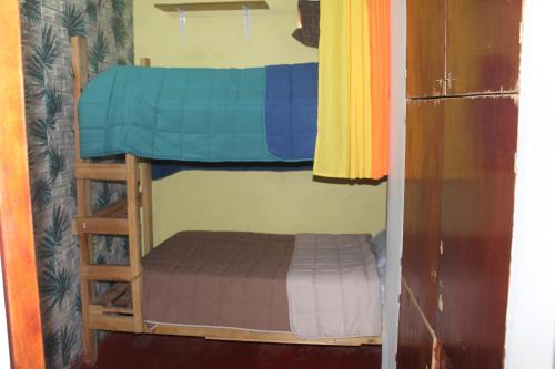 Ένα ή περισσότερα κρεβάτια σε δωμάτιο στο Hostel Posada de Gallo