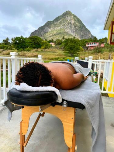 a woman laying on a chair with her hair at Desired View vacation rentals in LʼIvrogne