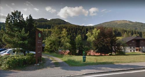 a sign on the side of a road with a mountain at Enzian 13 - Sonnige von Bad Kleinkirchheim in Bad Kleinkirchheim