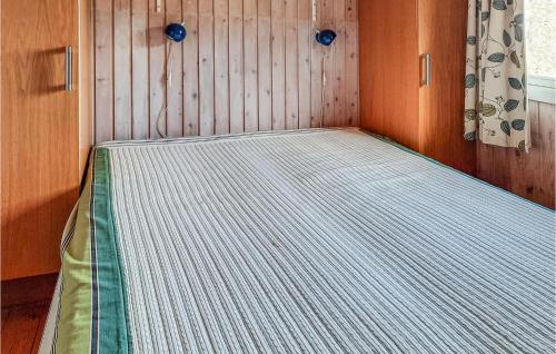 a bed in the back of a small boat at Amazing Home In Anholt With Wifi in Anholt