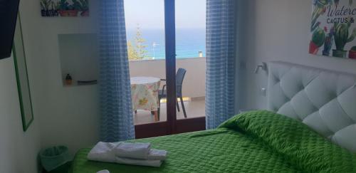 Ένα ή περισσότερα κρεβάτια σε δωμάτιο στο Eolie House