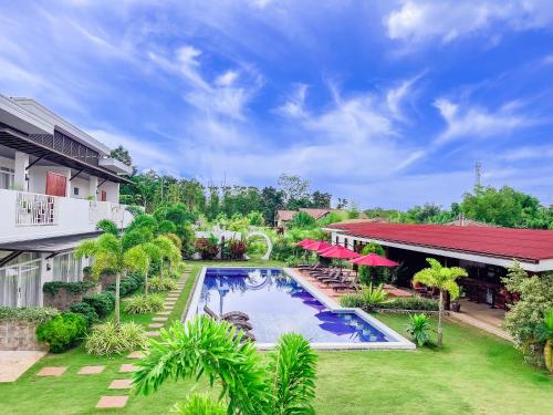 an aerial view of a resort with a swimming pool at Bella Napoli Resort & Resto in Panglao
