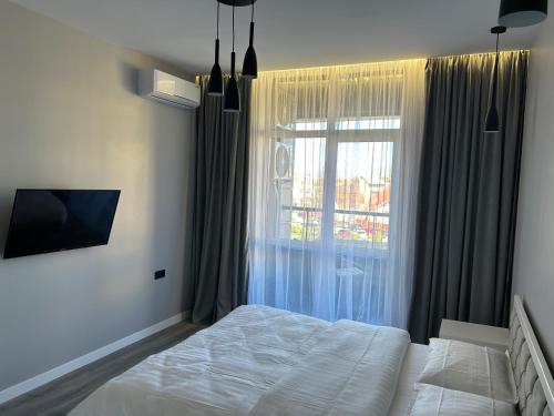 Katil atau katil-katil dalam bilik di EAvalonRestApartment