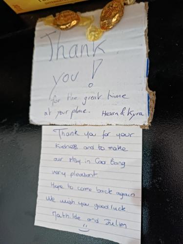a thank you note with handwriting on it at An Homestay - Bar & Motorbike Rental in Cao Bằng