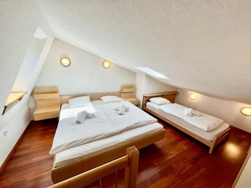 A bed or beds in a room at Apartment Anka
