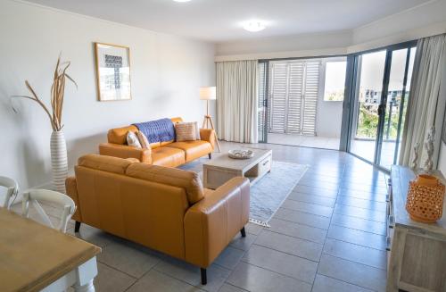 a living room with a couch and a table at Pavillions on 1770 in Agnes Water