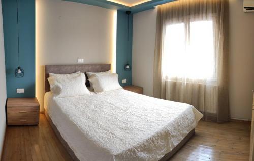 Ένα ή περισσότερα κρεβάτια σε δωμάτιο στο La Casa Delle Vacanze