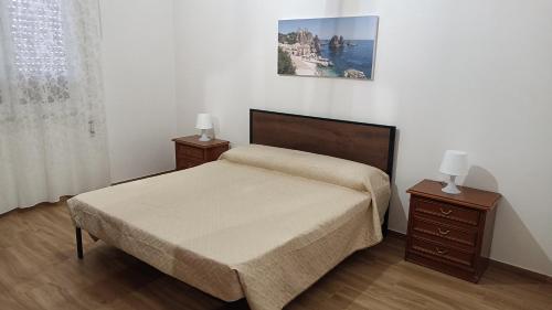 Postel nebo postele na pokoji v ubytování Scirocco e Maestrale