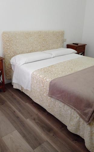 Gemini camere e suitesにあるベッド