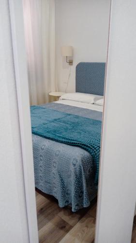 Gemini camere e suitesにあるベッド