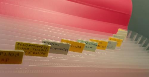 a bunch of sticky notes on the side of a piano at Stone House in olive grove in Tolo