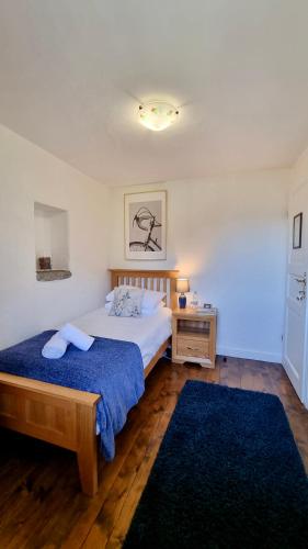 Postel nebo postele na pokoji v ubytování Hisa Brdo Guesthouse