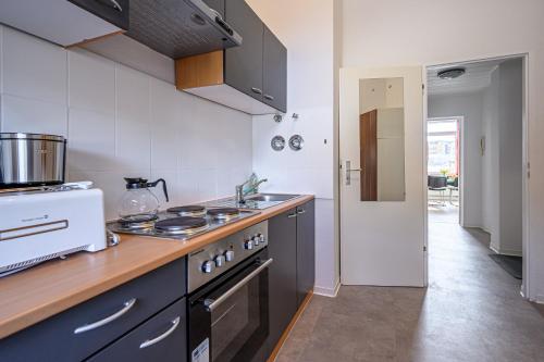 Kjøkken eller kjøkkenkrok på Kleine, ruhig gelegene Ferienwohnung in Plauen